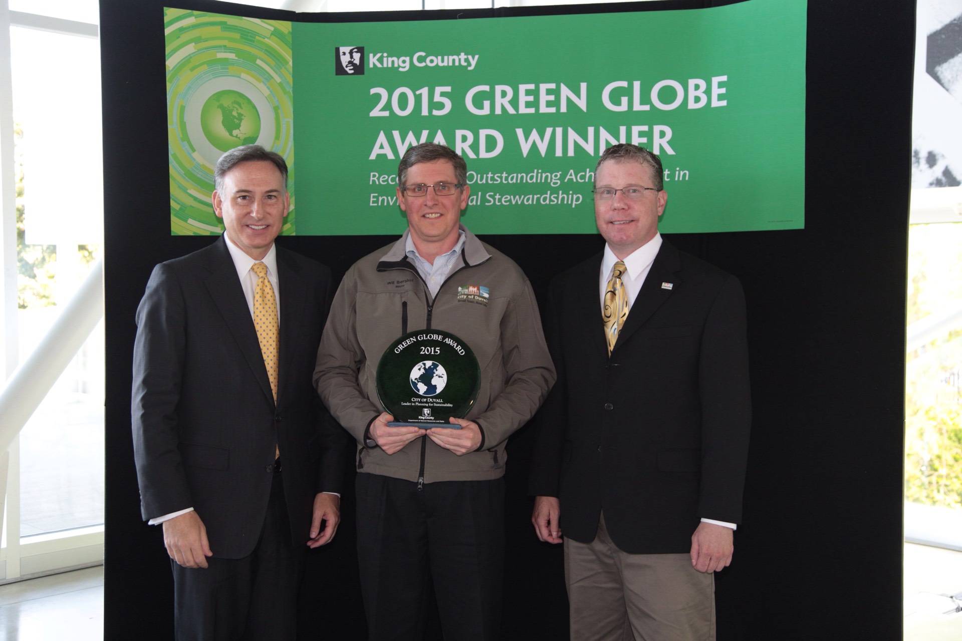 Mayor Ibersof, King County Exec Dow Constantine, and Councilmember Jason Walker